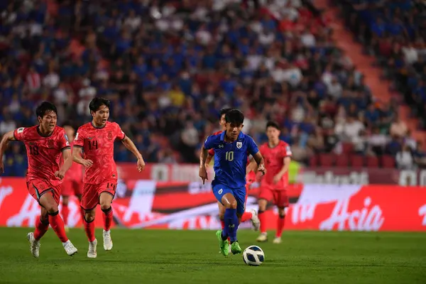 stock image Bangkok, Thailand - March 26, 2024: Suphanut Meuanta #10 Player of Thailand during World Cup qualified between Thailand against South Korea at Rajamangkala stadium, Thailand.