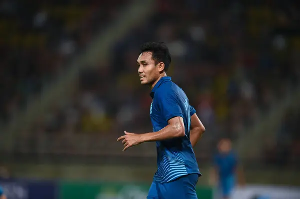 stock image Pathumthani, Thailand - December 11, 2022: Teerasil Dangda #10 player of Thailand during friendly match between Thailand against Myanmar at Thammasat stadium in Thailand.