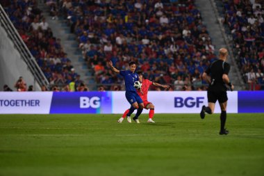 Bangkok, Tayland - 26 Mart 2024: Dünya Kupası sırasında Suphachok Sarachat # 7 Tayland Millî Futbol Takımı, Tayland 'daki Rajamangala Stadyumu' nda Güney Kore 'ye karşı mücadele etti.. 
