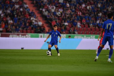Bangkok, Tayland - 26 Mart 2024: Dünya Kupası sırasında Suphachok Sarachat # 7 Tayland Millî Futbol Takımı, Tayland 'daki Rajamangala Stadyumu' nda Güney Kore 'ye karşı mücadele etti.. 