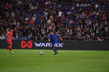 BANGKOK, THAILAND-26 MARCH, 2024: Tayland Dünya Kupası sırasında Tayland ile Tayland arasında oynanan 19 numaralı Poramet Arjwilai