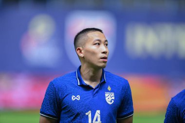 Pathumthani - Tayland - 31 Mayıs 2022: Tayland ile Tayland arasındaki dostluk maçı sırasında Tayland 'ın Bg Stadyumu' nda Bahreyn 'e karşı Patompon Charoenrattanapirom # 14 Tayland Oyuncusu