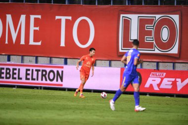 THANYABURI, PATHUMTHANI, THAILAND - 6 NOVEMBER, 2021:Tinnakorn asurin #6 Player of buriram united in action during thaileague2021 between bgpu against buriram at leo stadium,thailand clipart