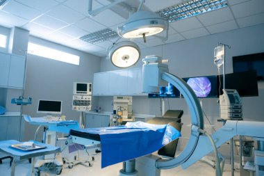 Empty operating room with bed and medical equipped in a hospital