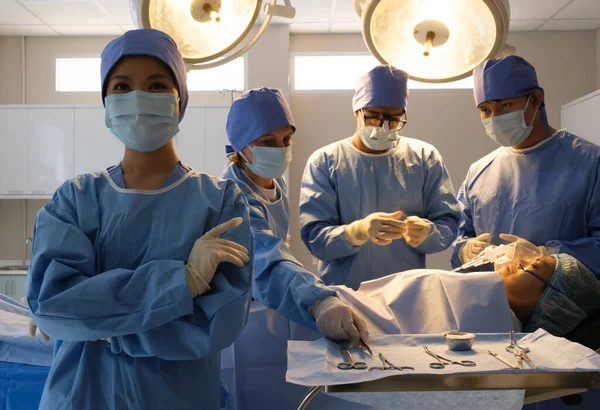 stock image The medical team operated on the patient in the operating room of the hospital.