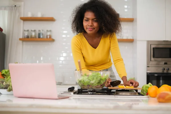 Multiracial Young Woman Cooking Salad Home — Stock Photo, Image