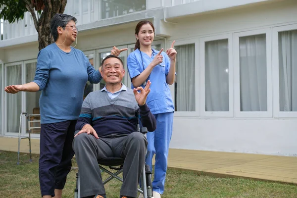 stock image Doctor examination and giving hope with elderly patient at home.