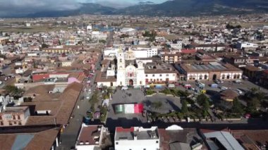 Chignahuapan, Puebla Mexico. Nov 23 2022. Panoramic drone view of the indigenous Baroque church Parroquia de Santiago Apstol in the central Plaza de Armas.