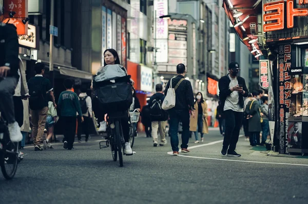 stock image Shinjuku, Tokyo- May 05 2023 :Nighttime Hustle and Bustle in Shinjuku A Vibrant Encounter of Neon Lights, Izakaya, and Crowded Streets