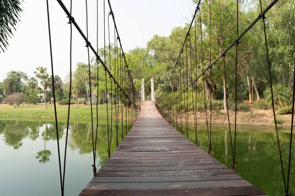 stock image Suspension bridge on nature abstract background on park/outdoor