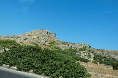 View of the greece nature - high mountain and lakes in valley. Summer nature with green colors.