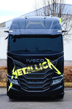 Ulm, Germany - February, 14, 2025: IVECO S-WAY Special Edition Metallica. Friont view. Vertical image. clipart