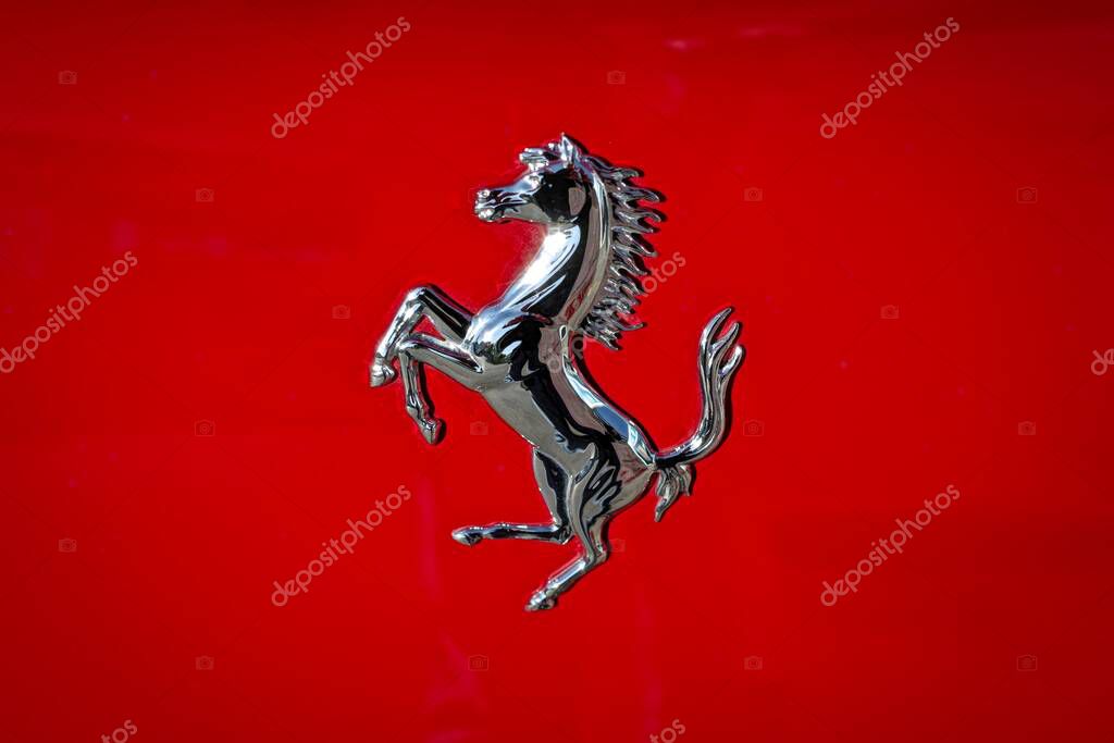 Senden, Germany - June, 04, 2025: Ferrari Car Industry Famous Horse Logo on the back of a Ferrari.
