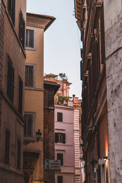 Narrow street of Rome on a sunny day