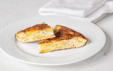 Traditional Spanish tortilla omelette made with eggs and potatoes