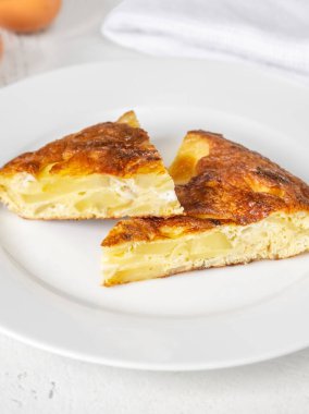 Traditional Spanish tortilla omelette made with eggs and potatoes