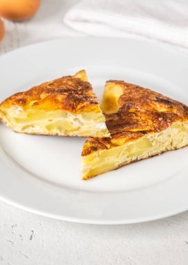 Traditional Spanish tortilla omelette made with eggs and potatoes