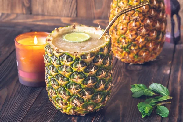 stock image Abacaxi Ricaco cocktail served on pineapple shell