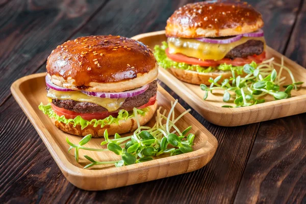 Two Glazed Burgers Wooden Background — Stock Photo, Image