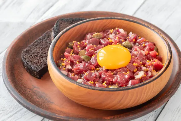 Portion Beef Steak Tartare Topped Raw Egg Yolk Royalty Free Stock Images