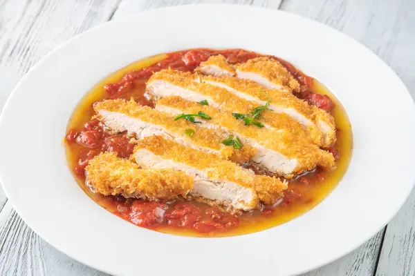 Chicken Milanese Cutlet Garnished Tomato Sauce Stock Picture