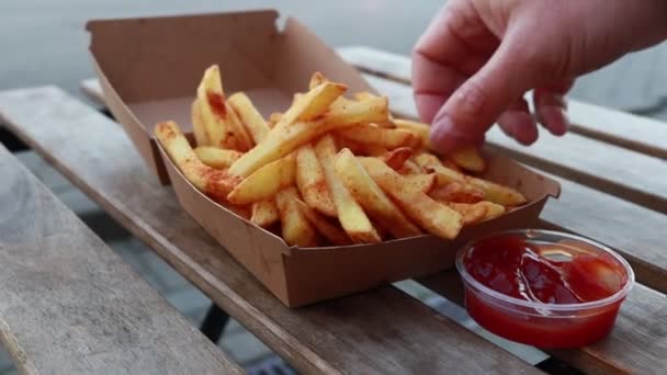 Hands Taking French Fries Box Dipping Them Ketchup Wooden Table — Stock Video