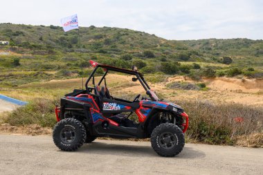 Kos, Greece - May 11, 2023: Buggy, recreational vehicle parked near Limnionas beach on Kos Island. Dodecanese, Greece clipart