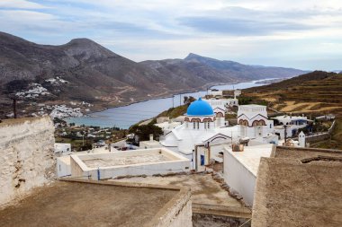 View of the Bay of Aegiali from the village of Tholaria. Amorgos Island, Greece clipart