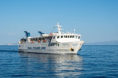 Amorgos, Greece - May 15, 2024: Express Skopelitis ferry serving Small Cyclades Lines routes. Aegiali port. Amorgos island, Greece clipart