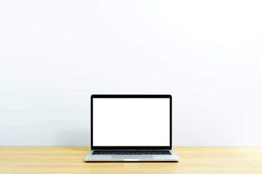 Laptop computer on wood table. Laptop with blank screen. White background