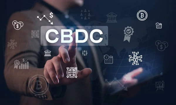 The concept of the digital currency of the Central Bank CBDC. The businessman clicks on a digital hologram with a CBDC concept presentation. Digital currency. Blockchain