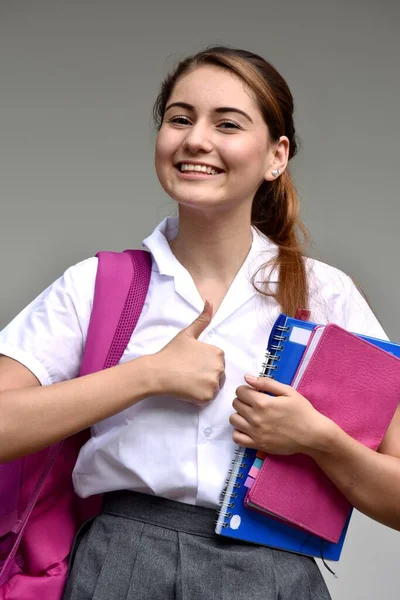 Szczęśliwy Katolicki School Girl Noszenie Mundur Szkoły Książkami — Zdjęcie stockowe