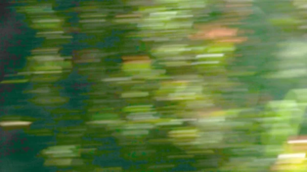 A Green Motion Blurred Abstract Background