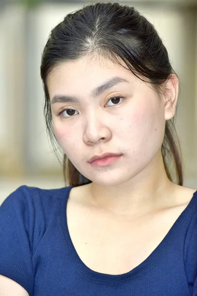 stock image A Serious Youthful Chinese Female