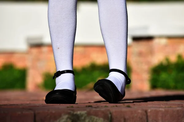 Girl With Black Shoes And White Socks