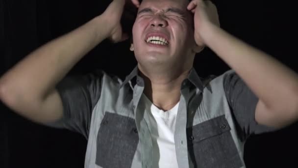 Stressed Asian Man Isolated Black — Stock Video