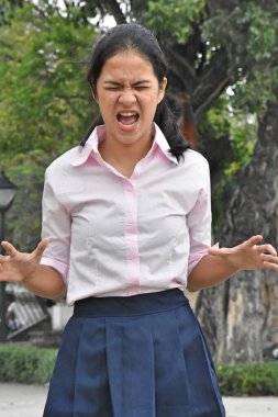 Youthful Philippine Youngster Under Stress In Public Park