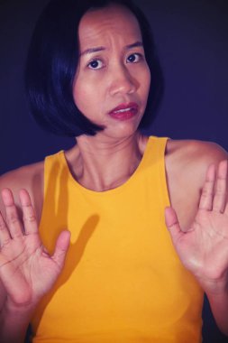 A Fearful Youthful Indonesian Person Isolated