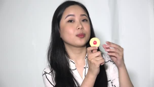 Female Adult Woman Eating Cookie Isolated — Video Stock