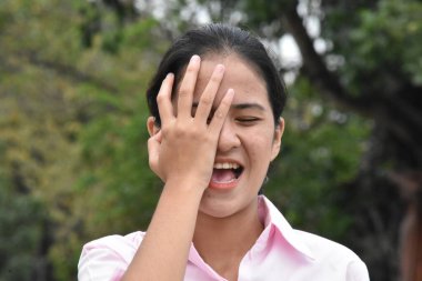 Minority Female Under Stress Wearing Pink Shirt Closeup