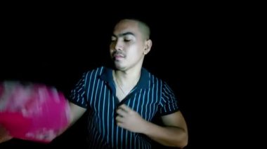 A Hot Asian Man With Fan