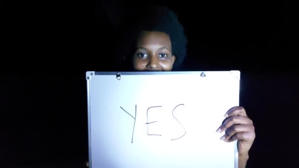 African Adult Female Holding Yes Sign — Stock Video