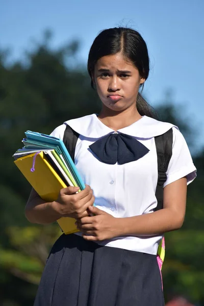制服を着た可愛い少女学生とうつ病 — ストック写真