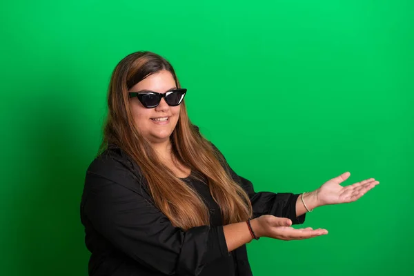 stock image Young woman wearing black glasses , Green Background is easy to change to any colour