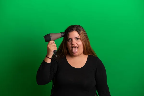 Young Woman Hairdryer Green Background Easy Change Any Colour — Stock Photo, Image