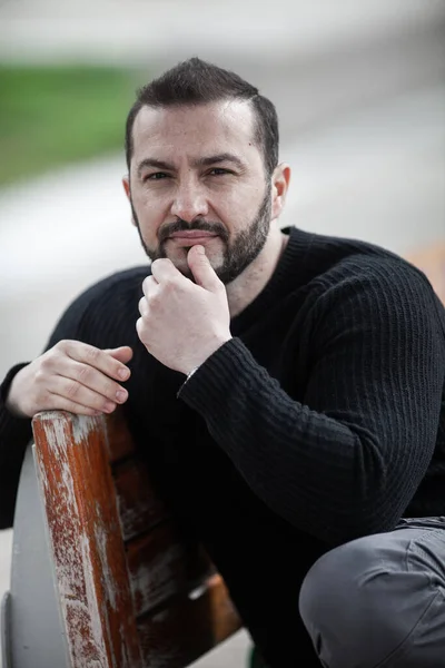 stock image Natural looking guy posing outdoors, wearing casual clothes, no post edit