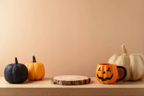 Empty wooden log on table with pumpkin over modern background. Halloween or Thanksgiving mock up for design and product display