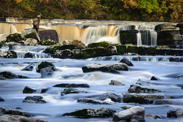 stock image Long Exposure of rocks in the River Swale at Richmond falls, Richmond North Yorkshire