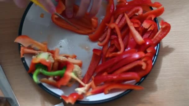 Sharp Knife Glides Ripe Red Pepper Overhead Close Woman Skilled — Video