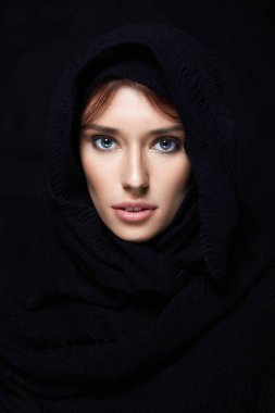 beautiful young woman in hood or hijab.fashion muslim style girl. religion
